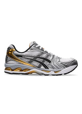 Asics' GEL-KAYANO 14 - White/Pure Gold. Køb sneakers her.