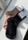 Acne Studios' FN-UX-ACCS000078 - Black/Ivory. Køb socks/stockings her.